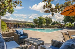Outdoor pool, open 8 AM to 10 PM, sun loungers