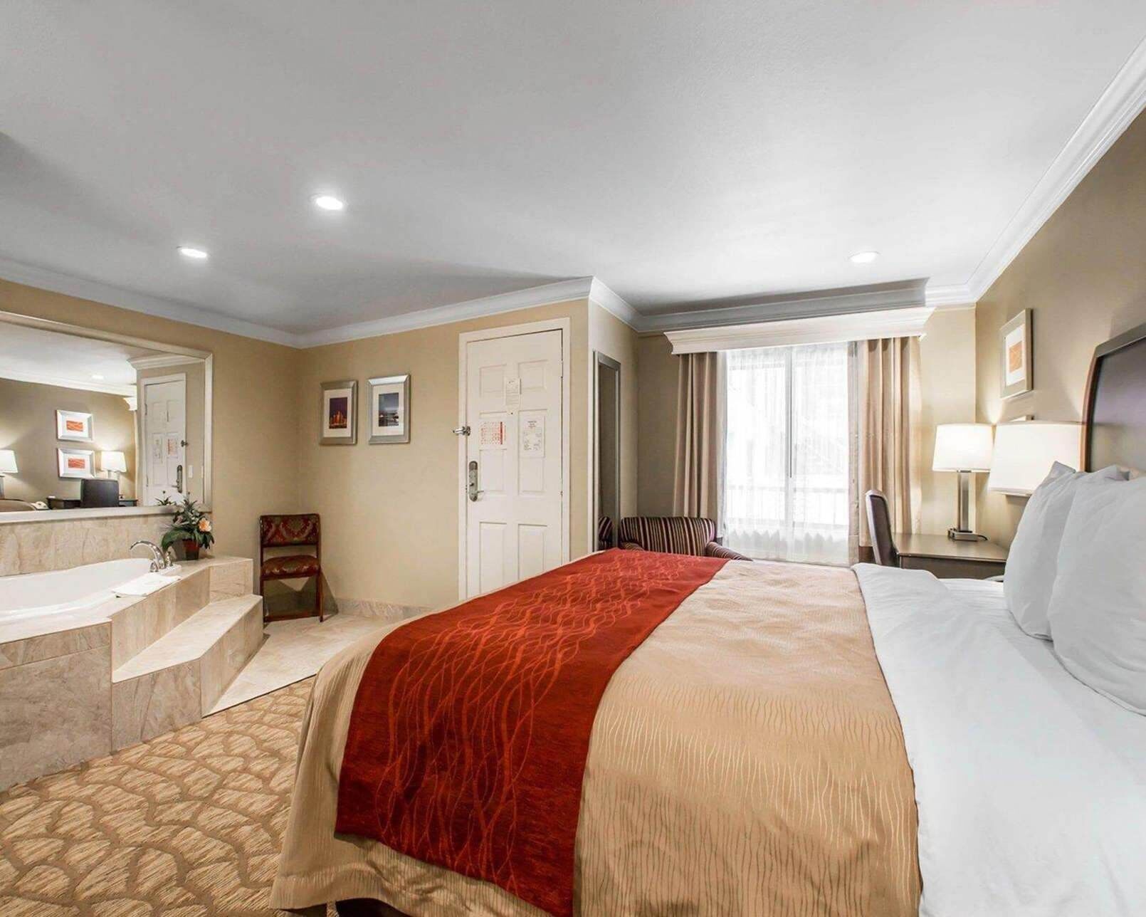 Pillowtop beds, desk, laptop workspace, blackout drapes