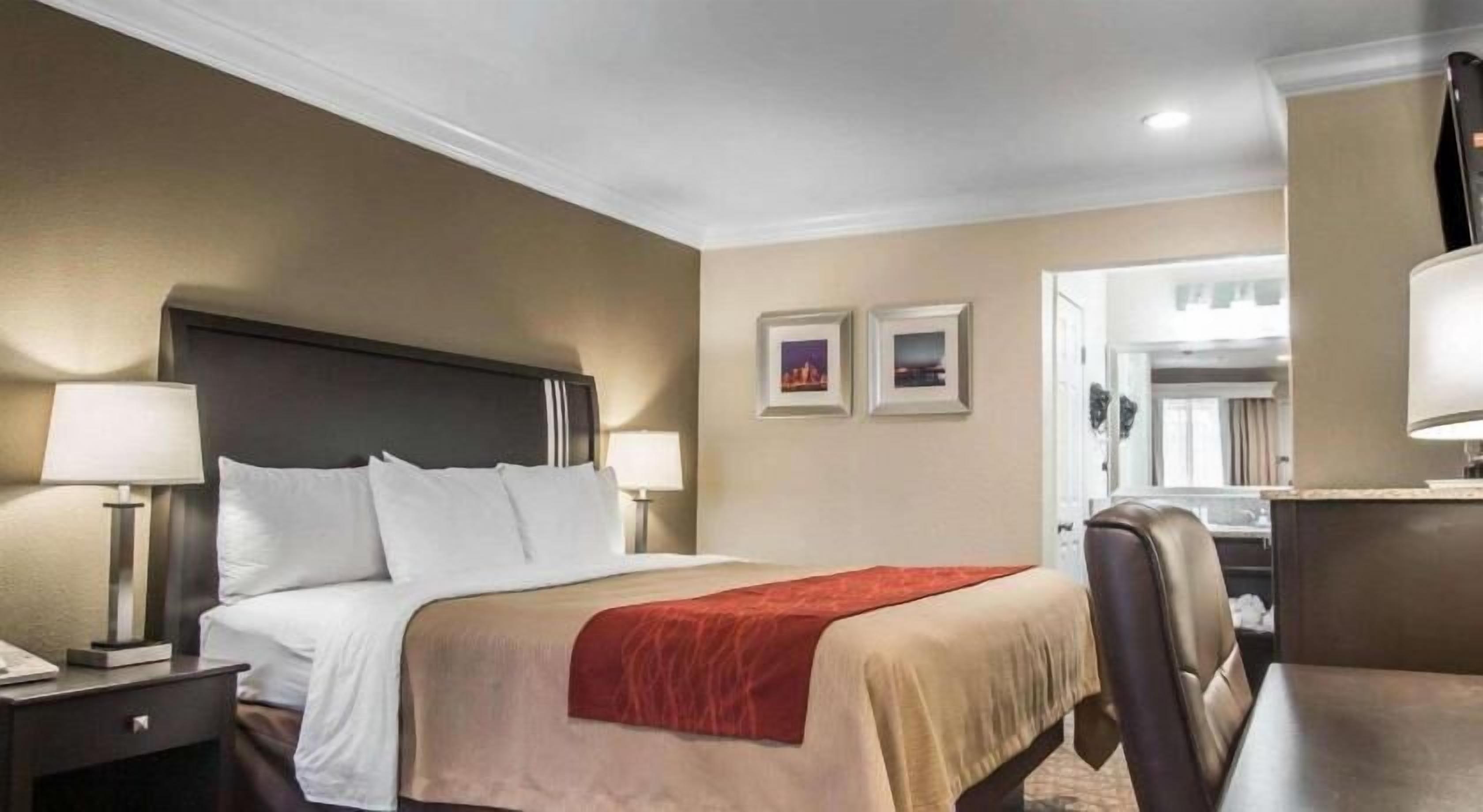 Pillowtop beds, desk, laptop workspace, blackout drapes