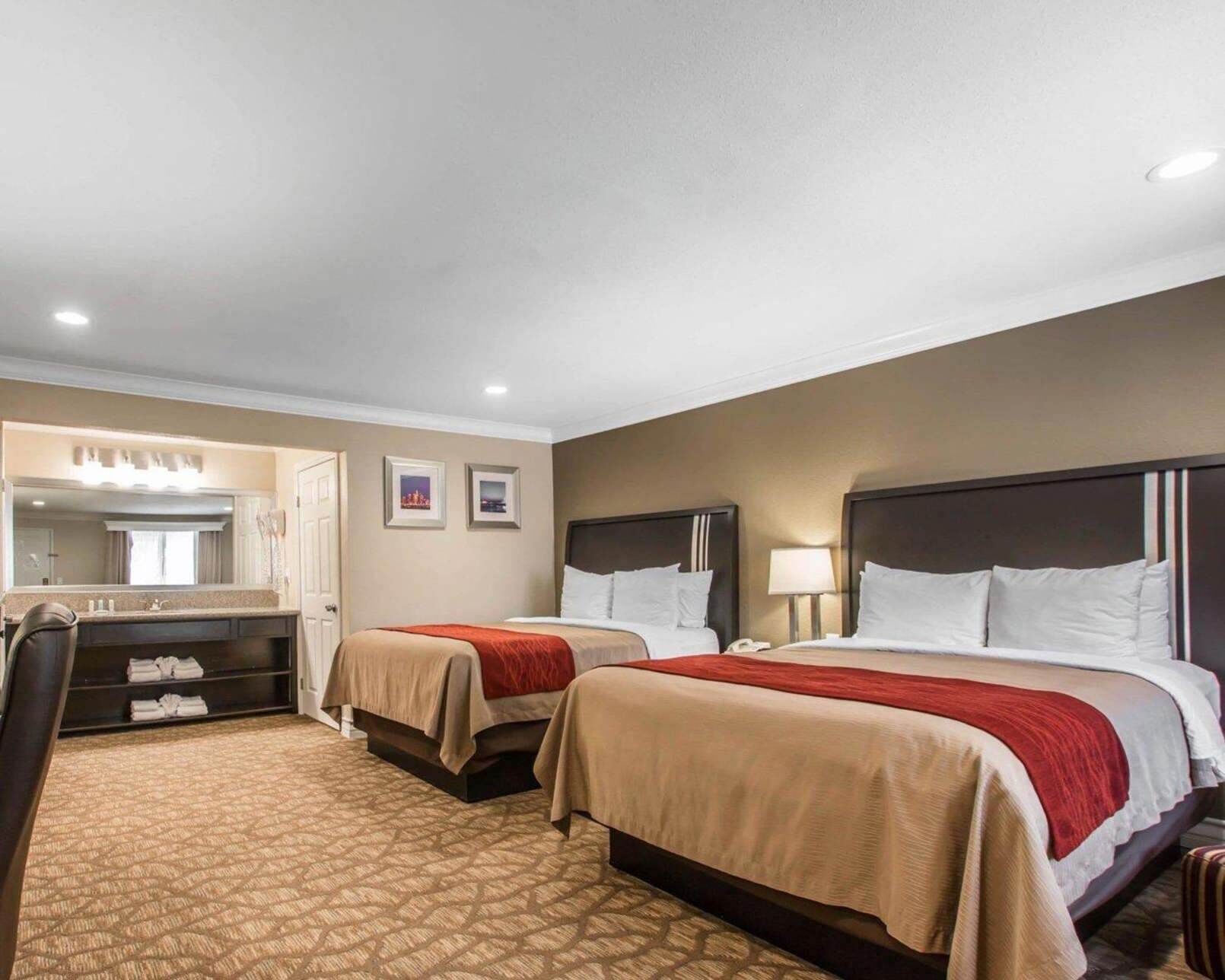 Pillowtop beds, desk, laptop workspace, blackout drapes