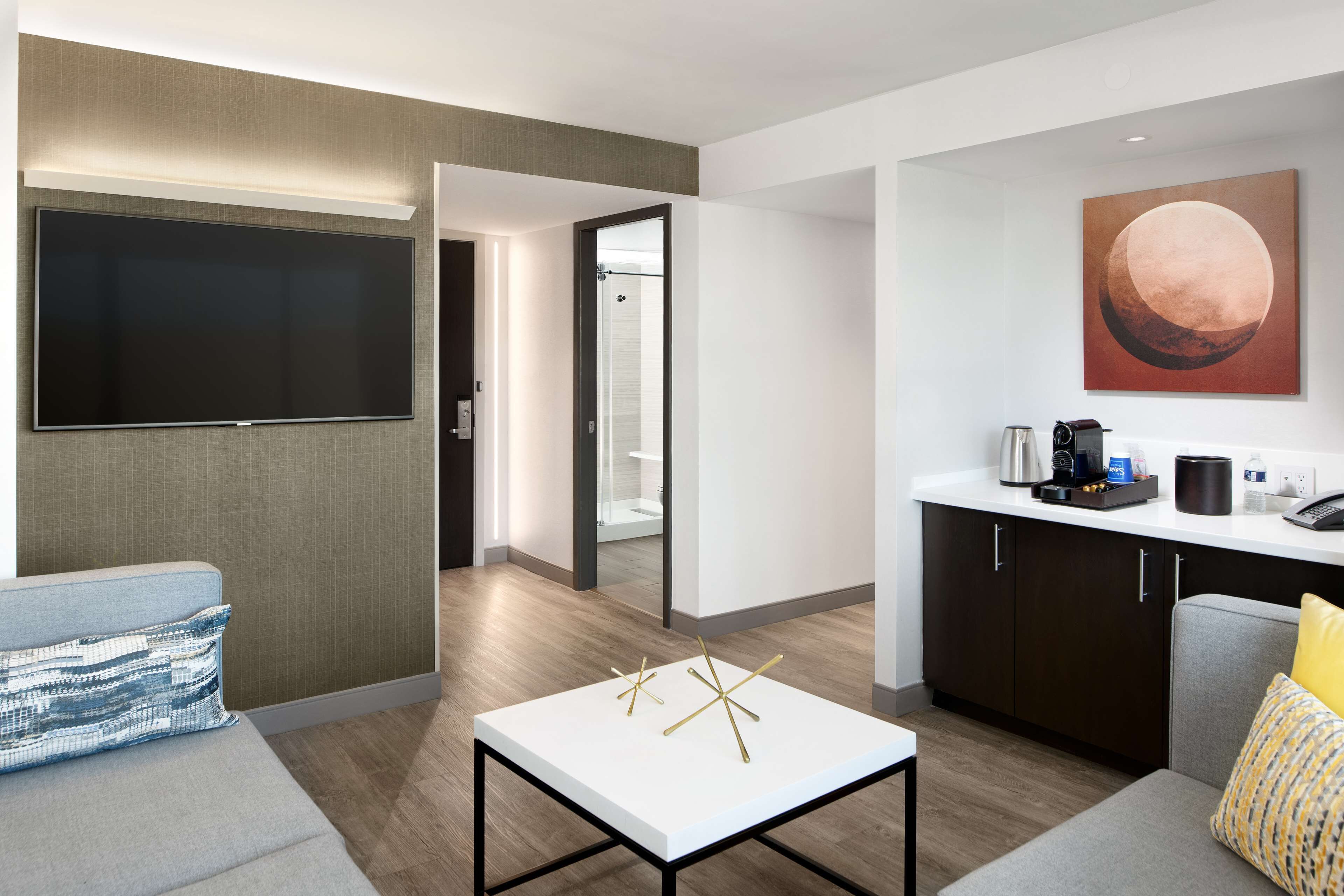 65-inch flat-screen TV with cable channels, TV, Netflix