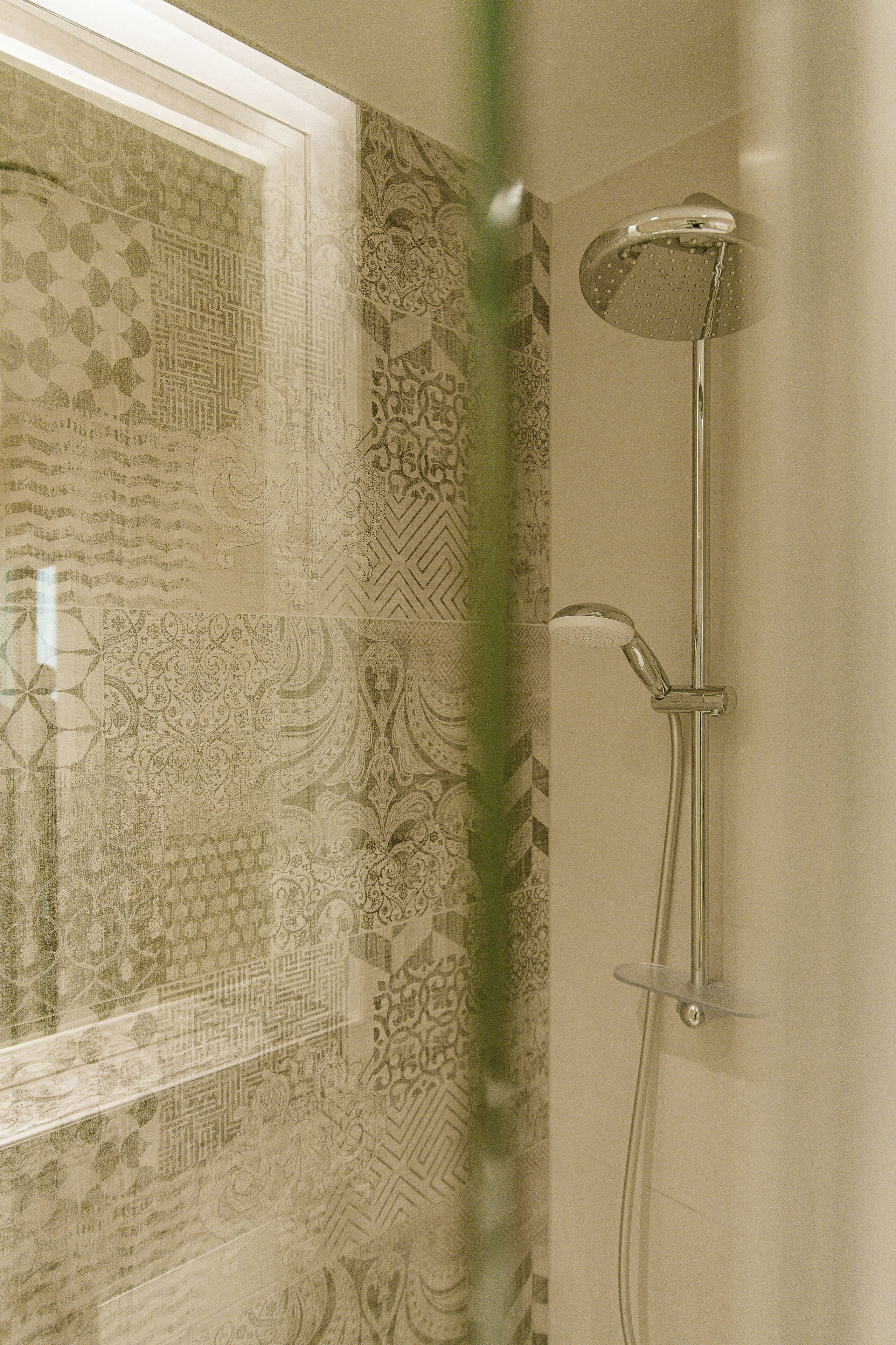 superior double room | bathroom | eco-friendly toiletries, hair dryer, towels