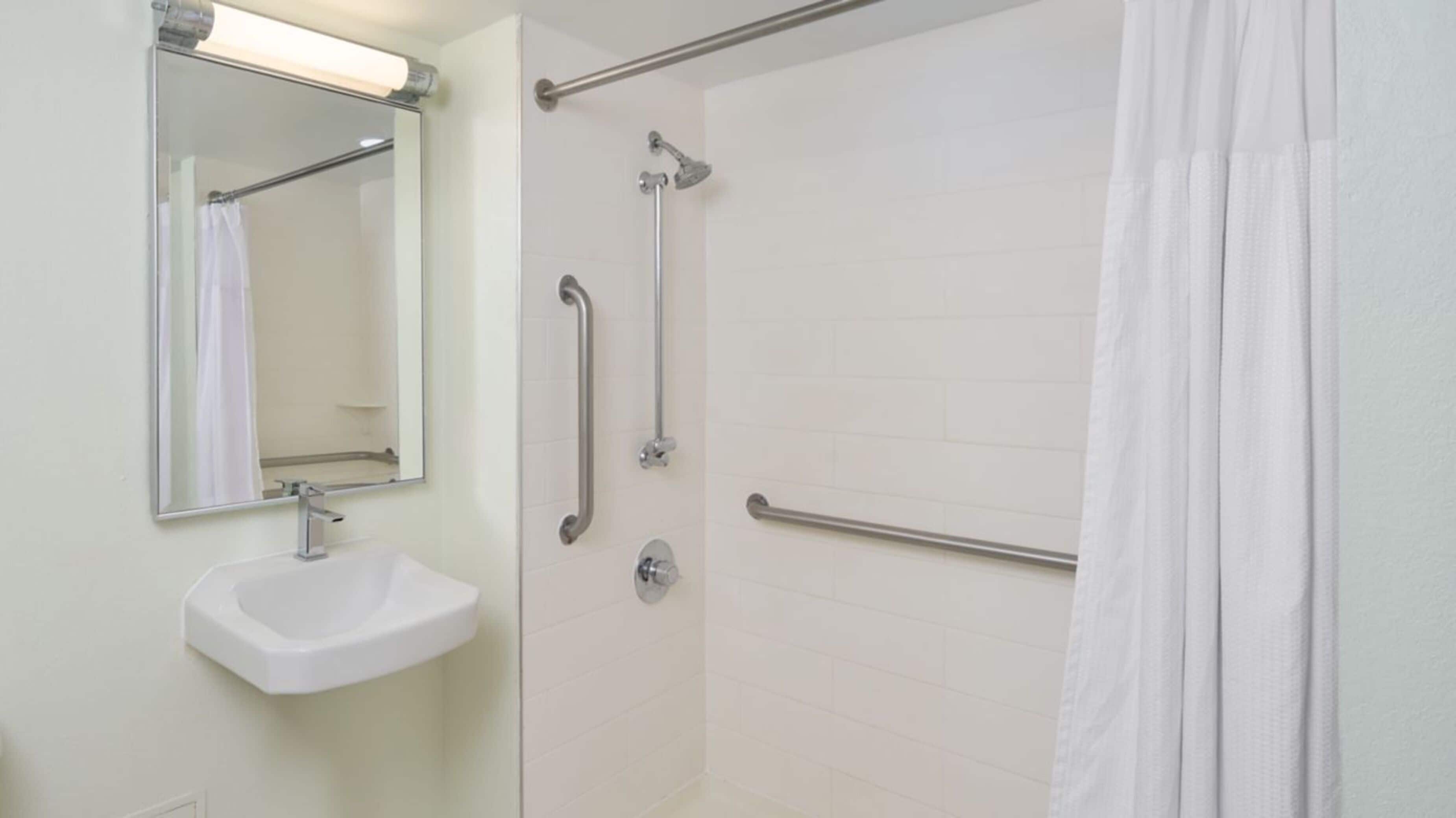 combined shower/bathtub, free toiletries, hair dryer, towels