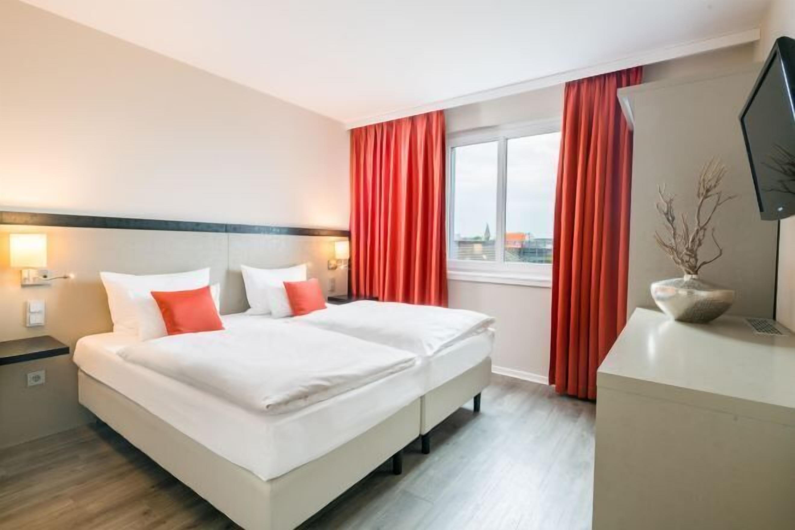 Hypo-allergenic bedding, down comforters, pillowtop beds, in-room safe