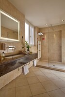 Suite, 1 King Bed with Sofa bed | Bathroom | Free toiletries, hair dryer, slippers, bidet