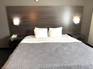 Desk, laptop workspace, iron/ironing board, cots/infant beds