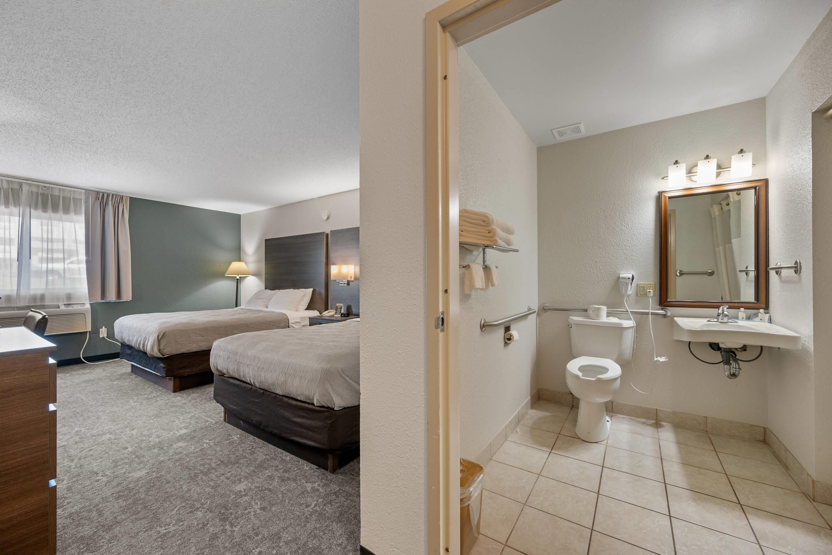 room, 2 queen beds, non smoking | desk, laptop workspace, iron/ironing board, cots/infant beds