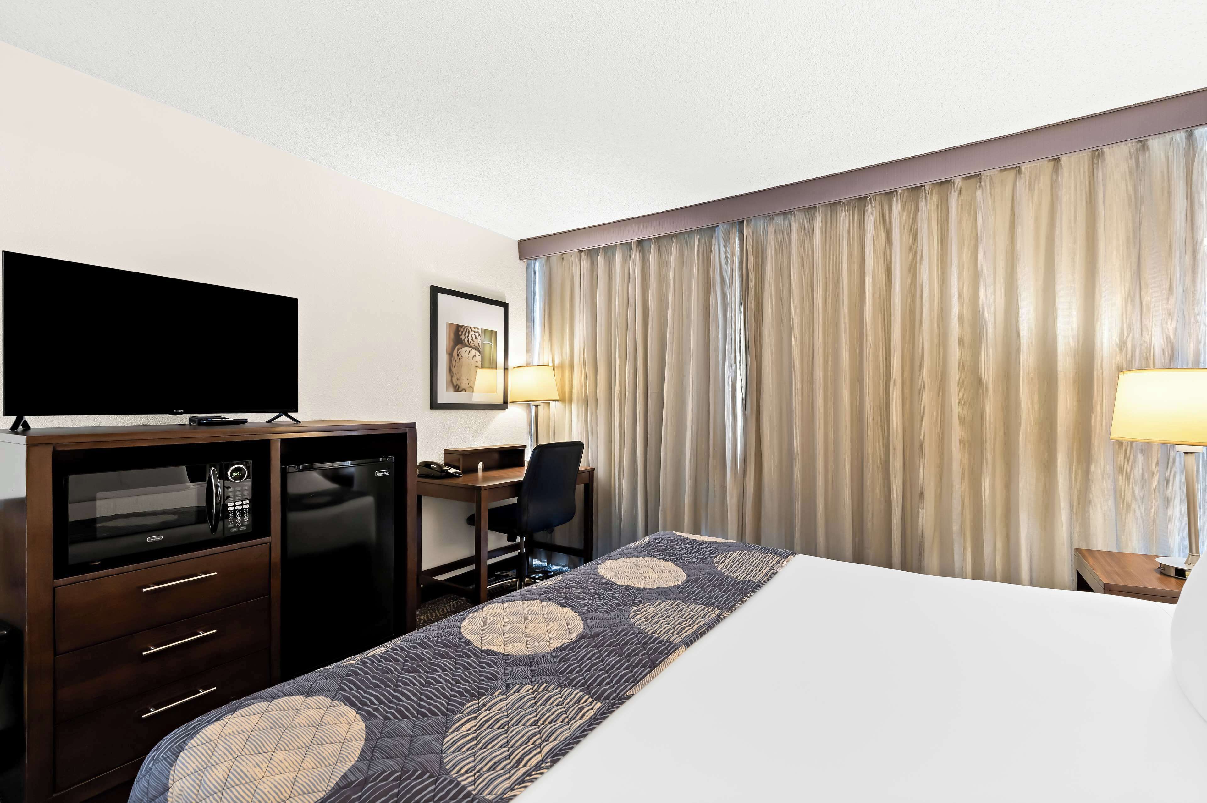 desk, blackout curtains, iron/ironing board, cots/infant beds