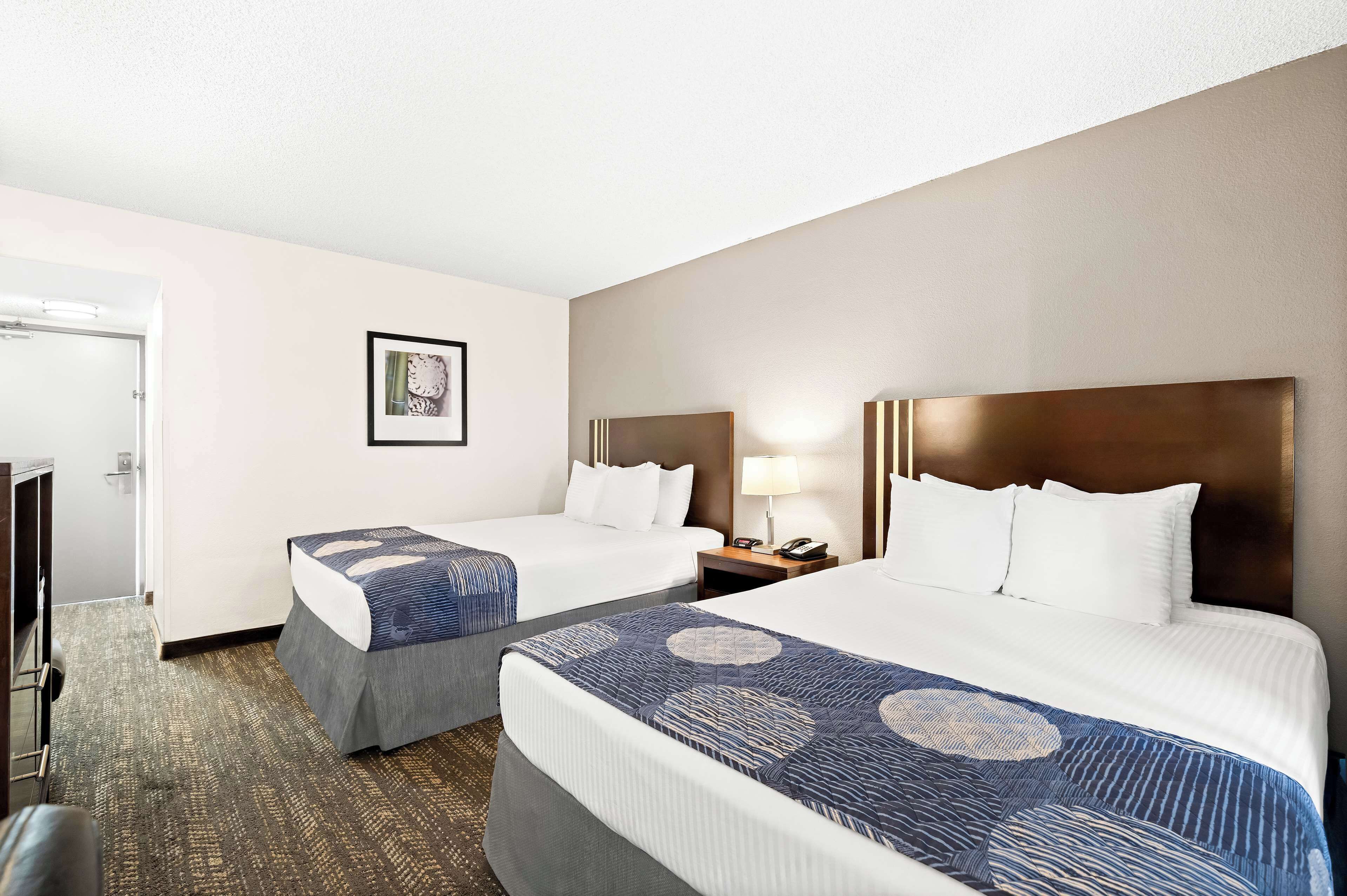 desk, blackout curtains, iron/ironing board, cots/infant beds