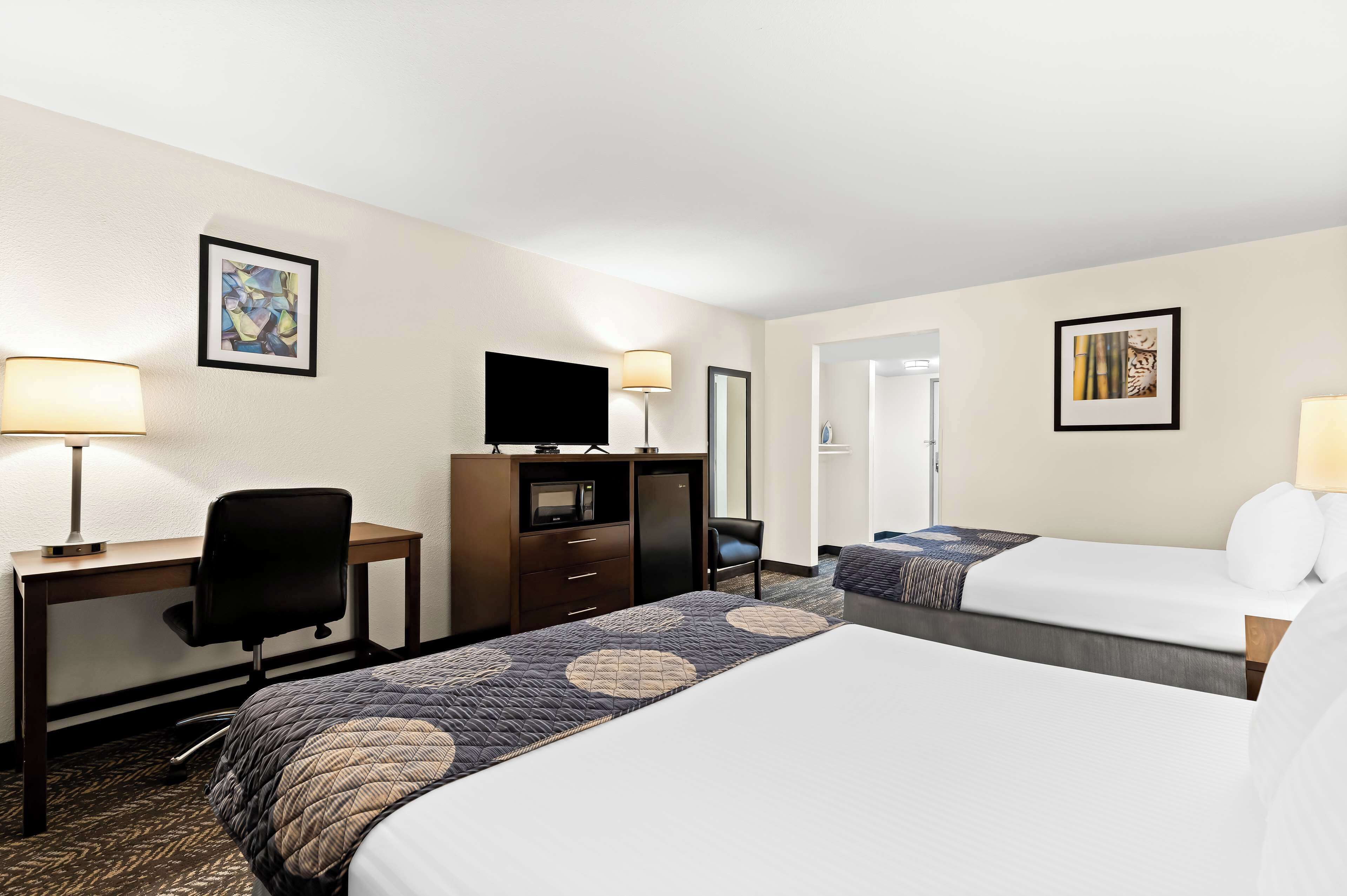 standard room, 2 queen beds, non smoking, microwave | desk, blackout curtains, iron/ironing board, cots/infant beds