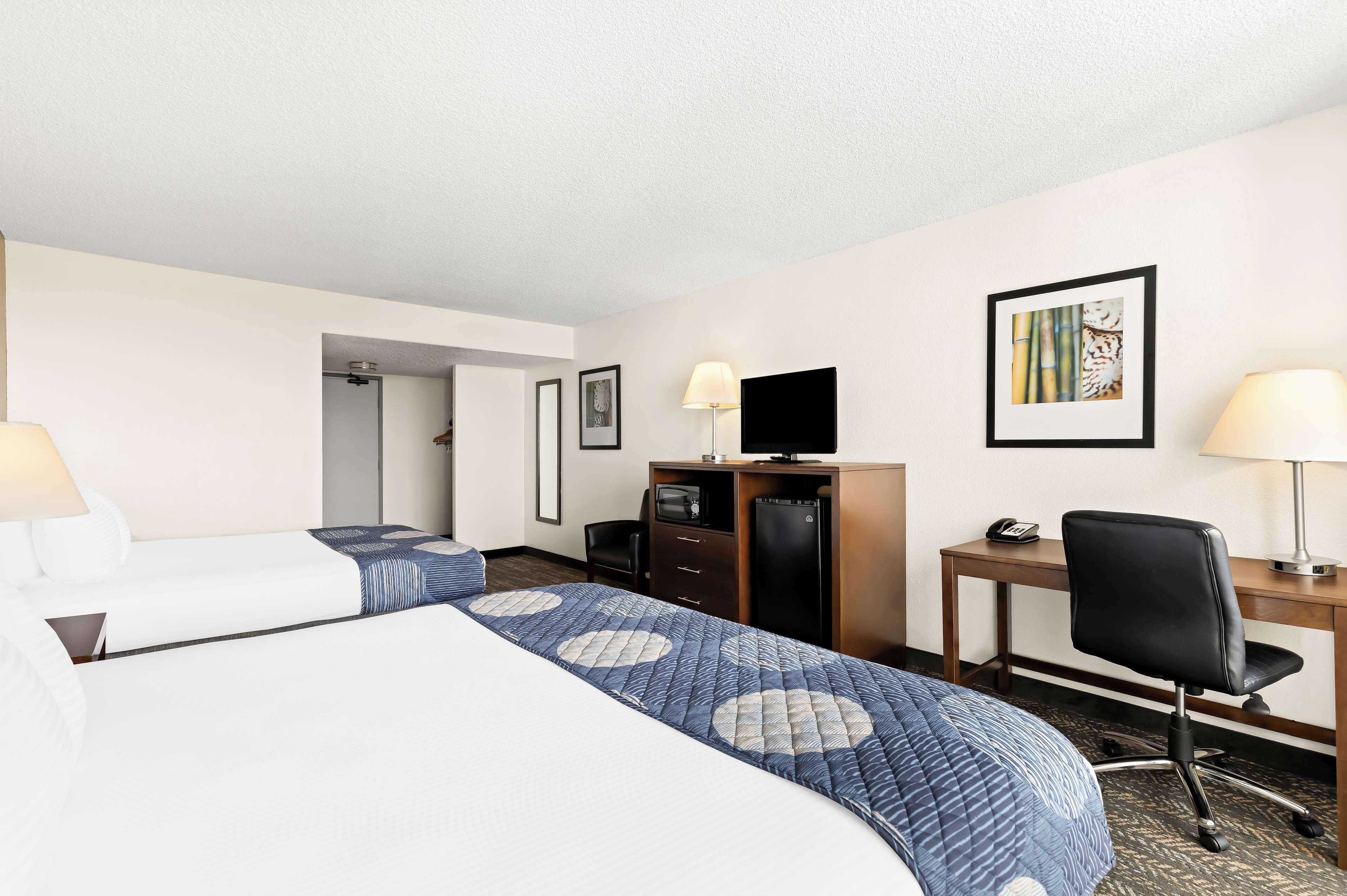 desk, blackout curtains, iron/ironing board, cots/infant beds