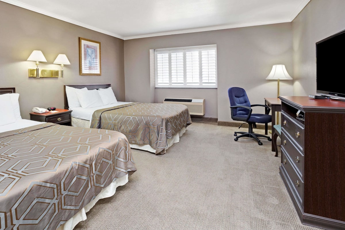 Desk, laptop workspace, blackout curtains, iron/ironing board