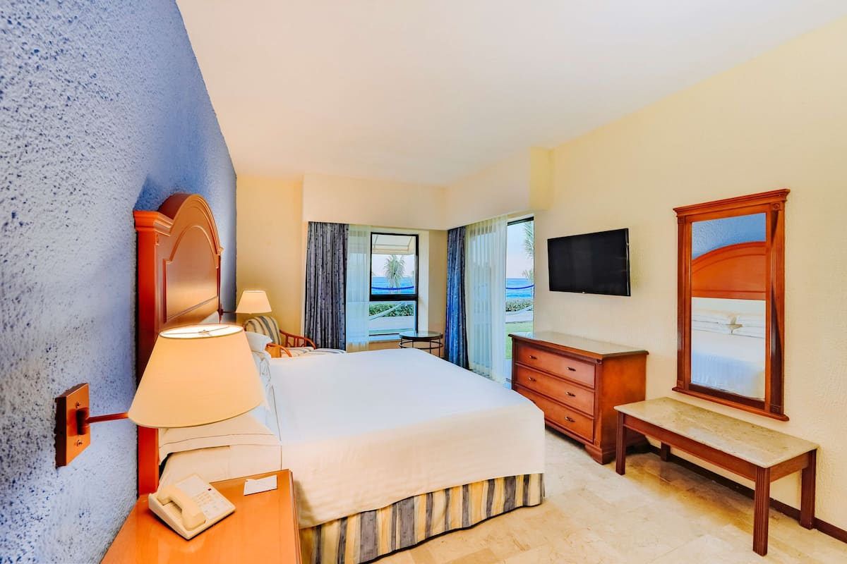 Suite Premium, frente al océano (Level) | 1 habitación y artículos del minibar gratis