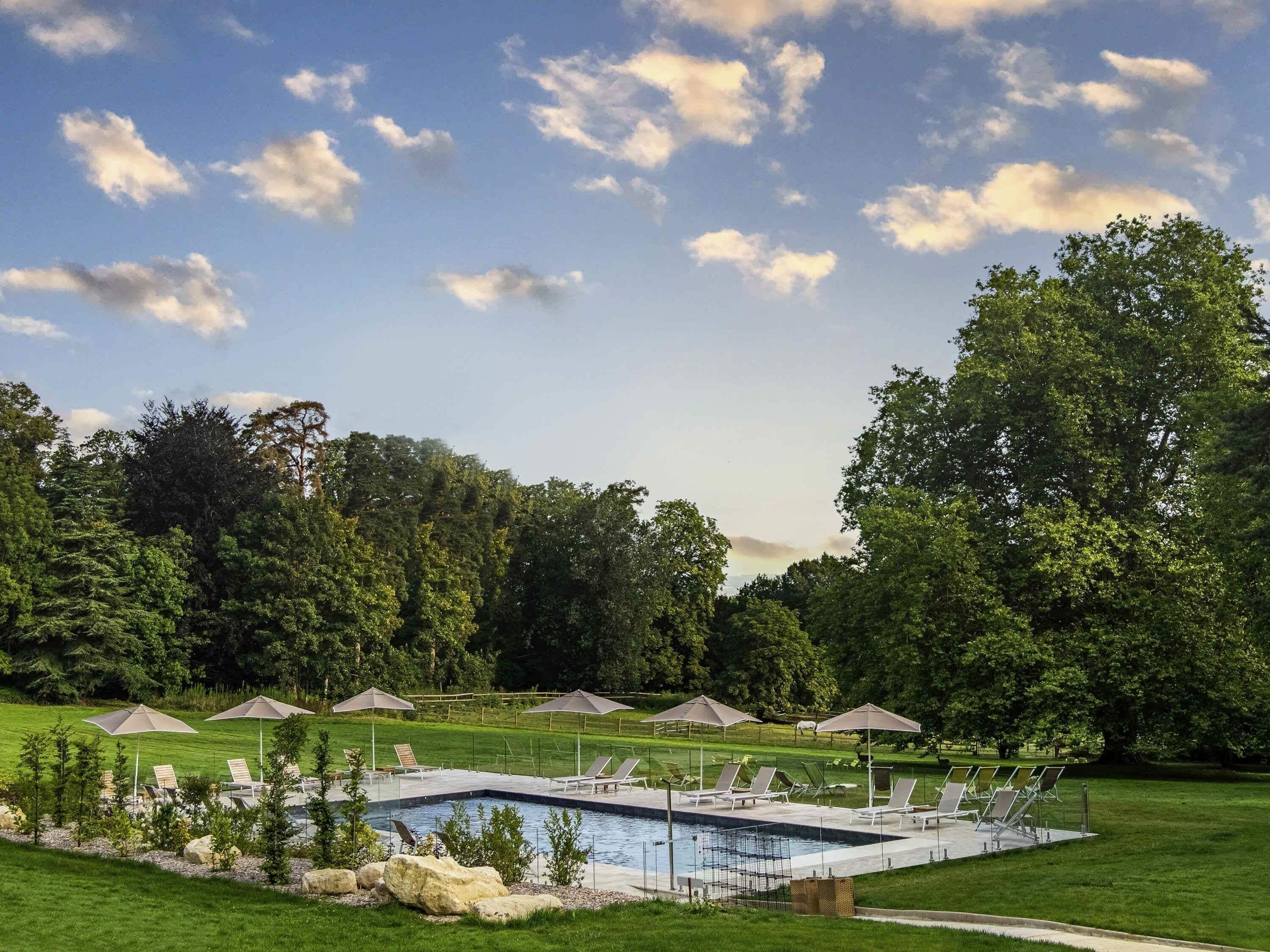 Indoor pool, seasonal outdoor pool, pool umbrellas, sun loungers