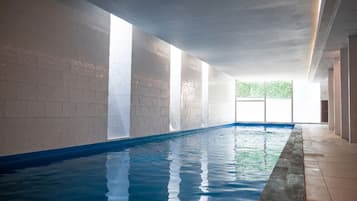 Indoor pool, seasonal outdoor pool, pool umbrellas, pool loungers