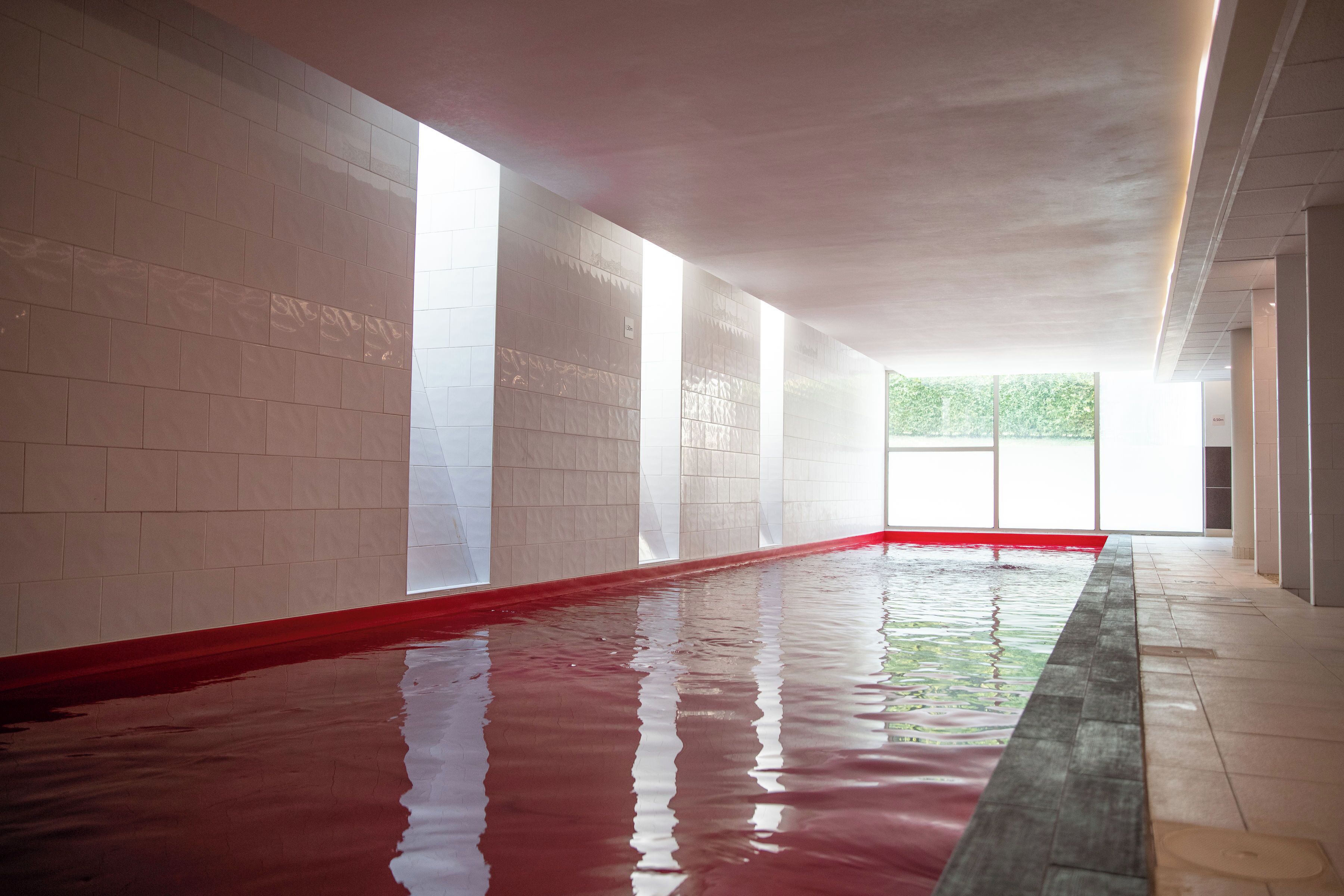 indoor pool, seasonal outdoor pool, pool umbrellas, pool loungers