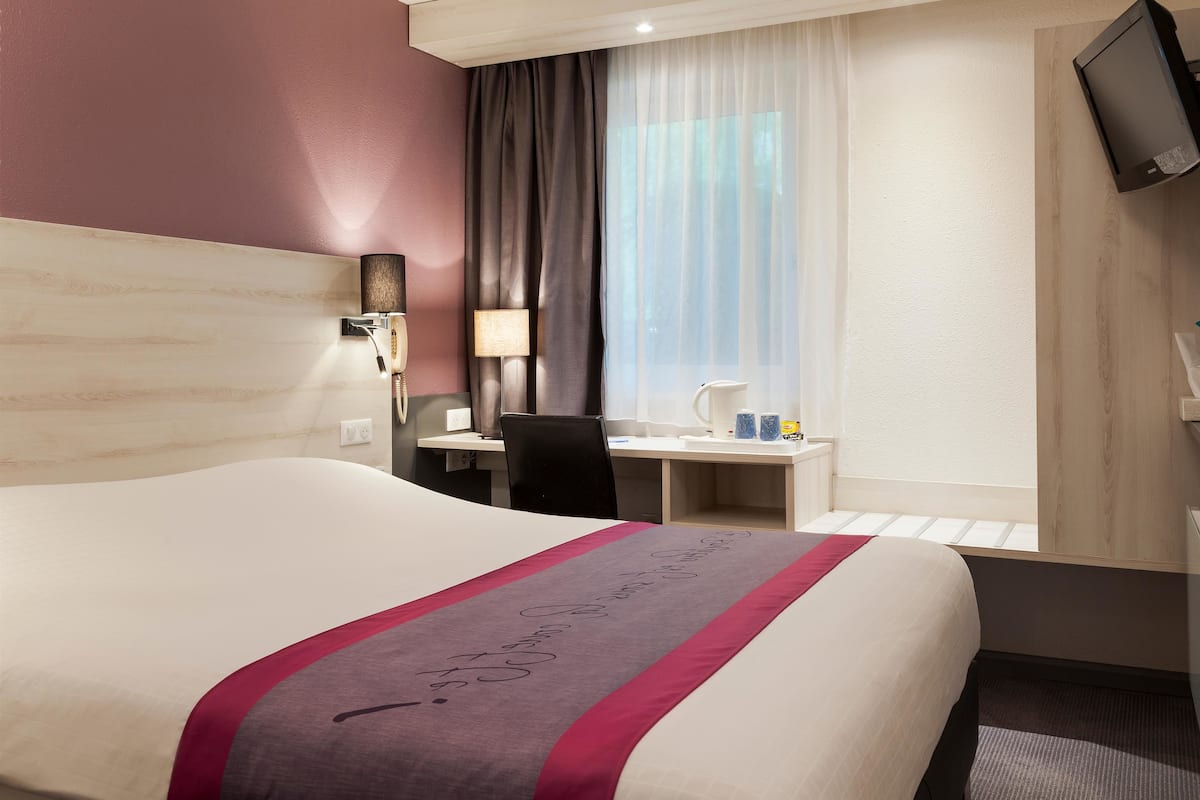 Ropa de cama de alta calidad, camas Select Comfort y escritorio
