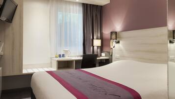 Luxe beddengoed, Select Comfort-bedden, een bureau, geluiddichte muren