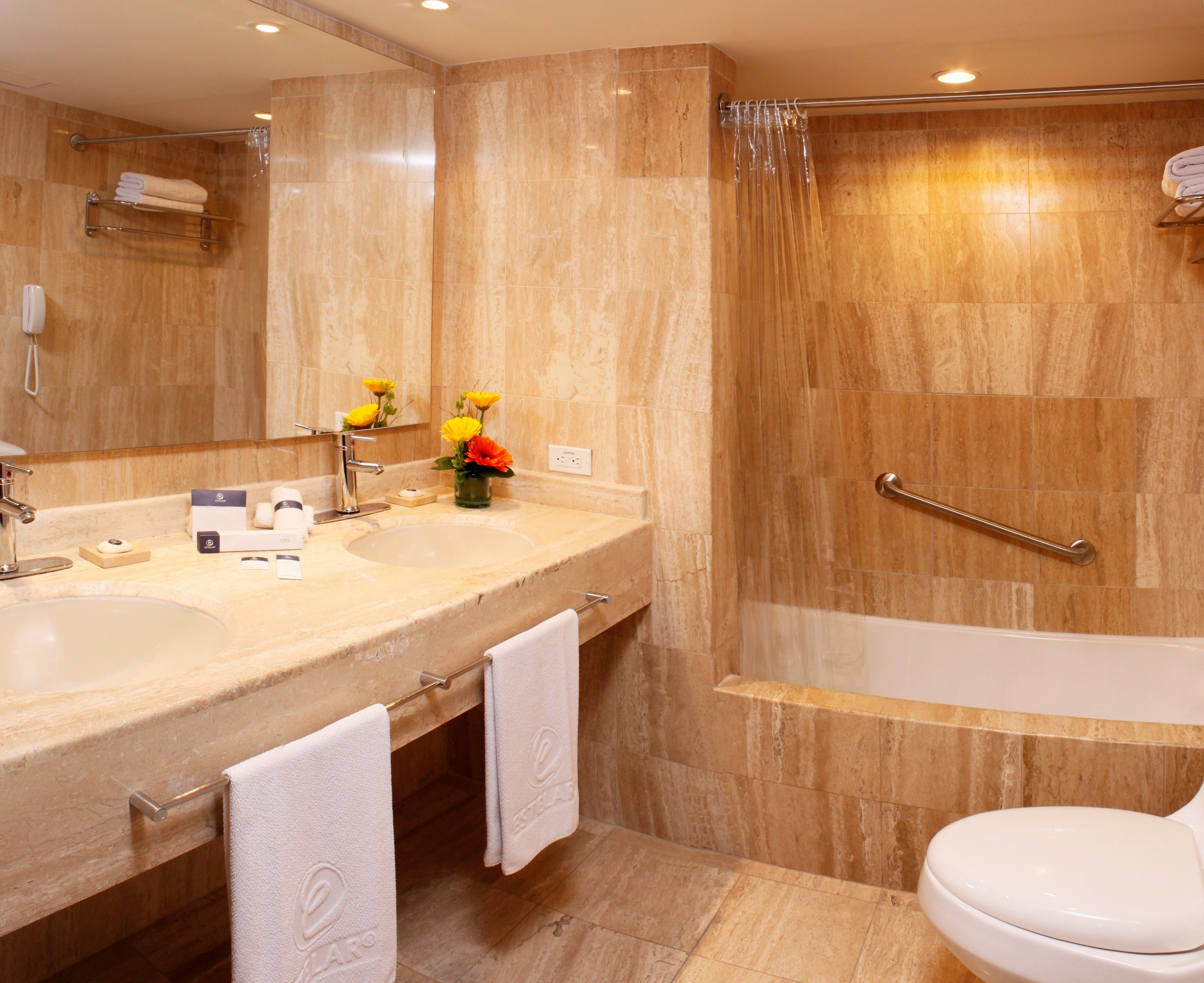 shower, deep-soaking bathtub, rainfall showerhead, designer toiletries