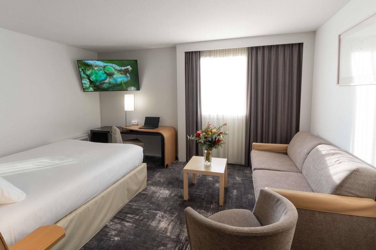 Executive-rum - 1 dubbelsäng med bäddsoffa | Sängtillbehör av högsta kvalitet och minibar