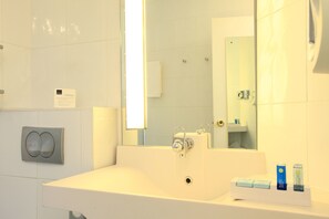 Eco-friendly toiletries, hair dryer, towels