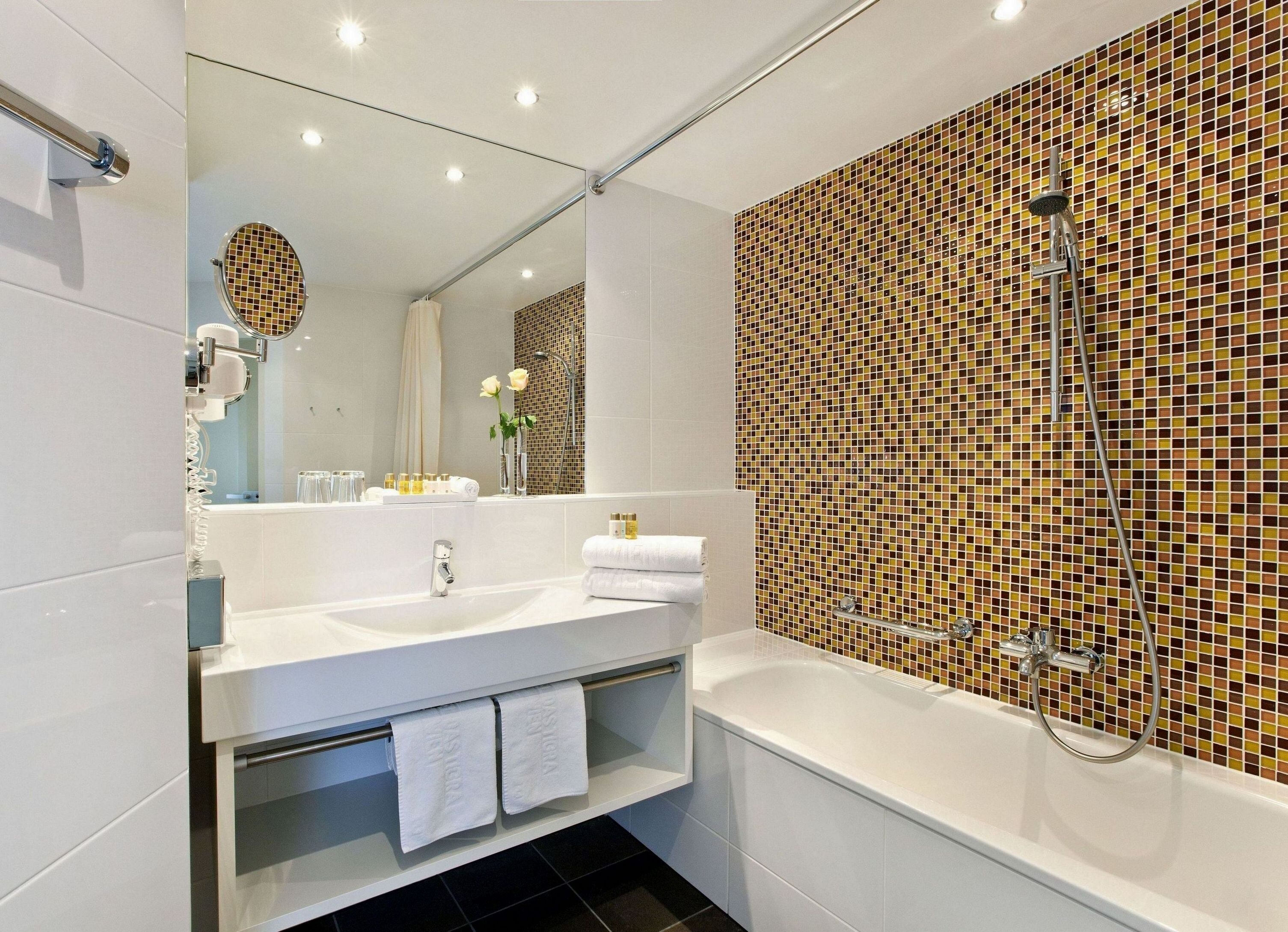 superior room | bathroom | eco-friendly toiletries, hair dryer, towels