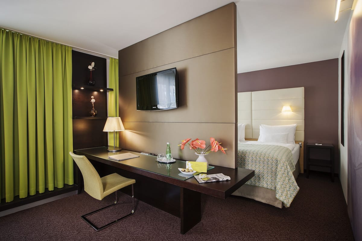 Junior Suite | 1 bilik tidur, peralatan tempat tidur premium, bar mini