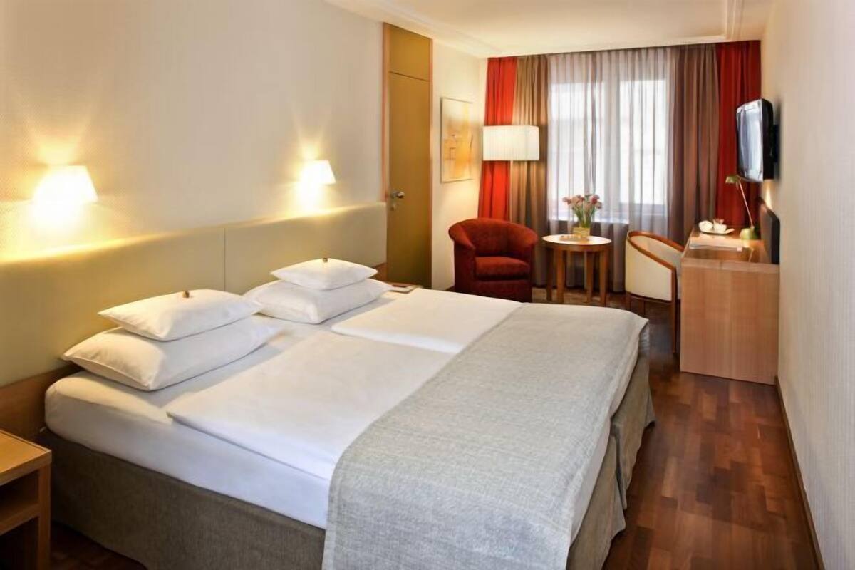 Ropa de cama de alta calidad y minibar