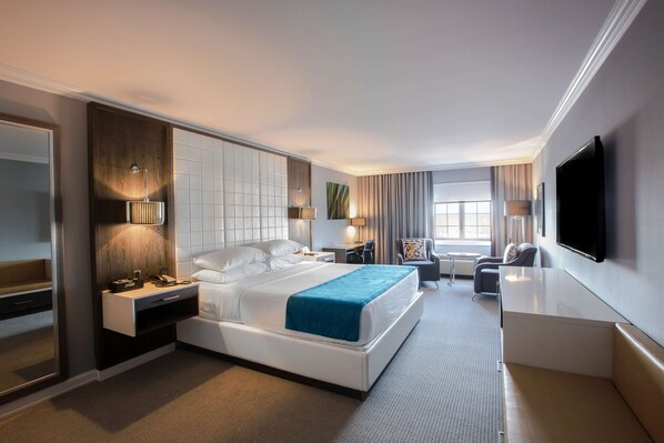 Habitación Deluxe, 1 cama King size | 1 habitación, decoración personalizada, muebles diferentes y escritorio 