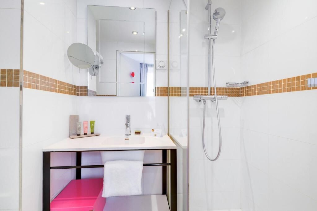 standard double room - complimentary soft minibar,  courtesy tray, digital press | bathroom | shower, free toiletries, hair dryer, towels