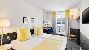 A hotel room with two beds, a desk, a chair, a TV, and a window with curtains. - Hôtel Augustin - Astotel (Paris)