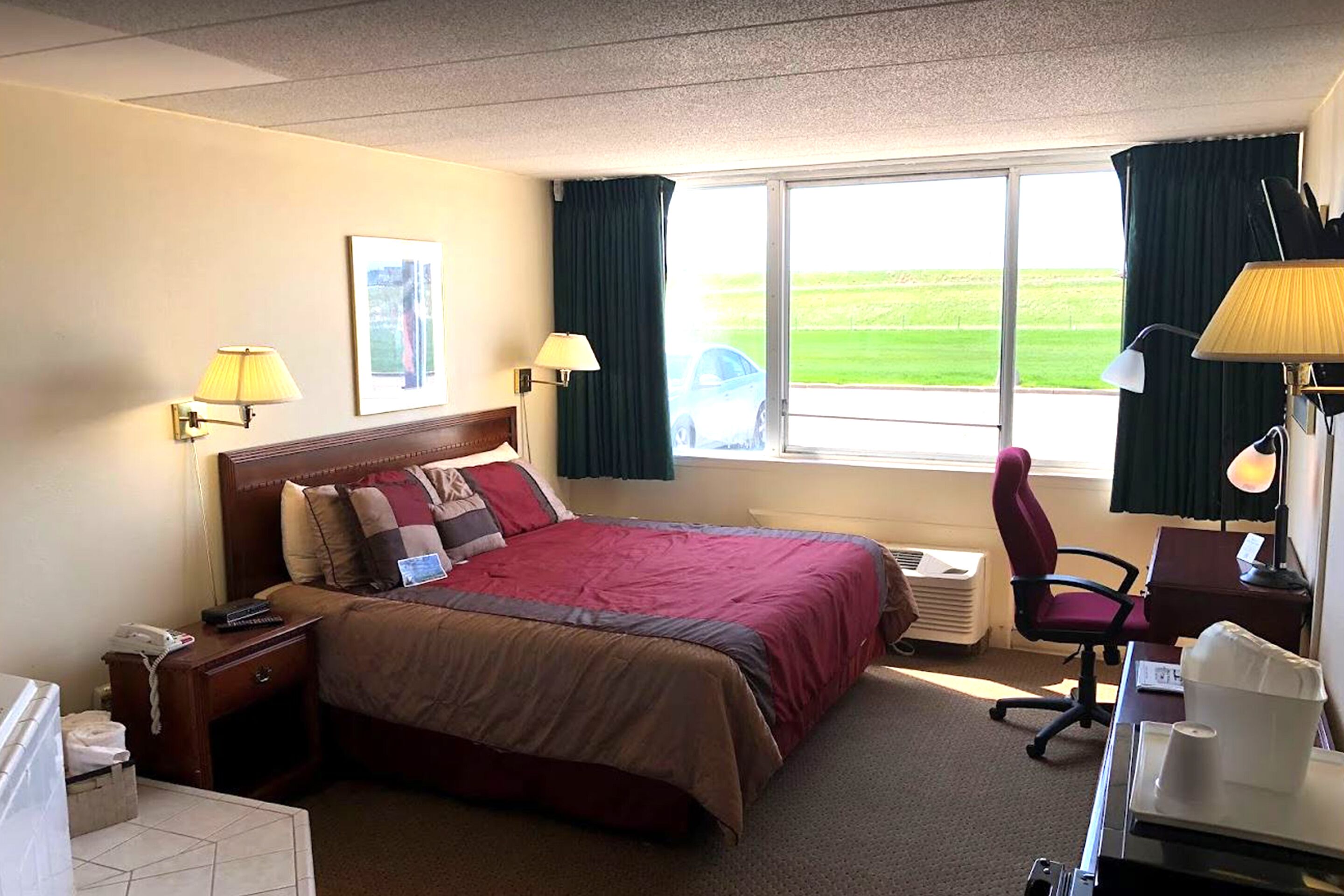 スタジオスイート キングベッド 1 台 禁煙 ジェットバス | 遮光カーテン、防音設備、アイロン / アイロン台、ベッドシーツ