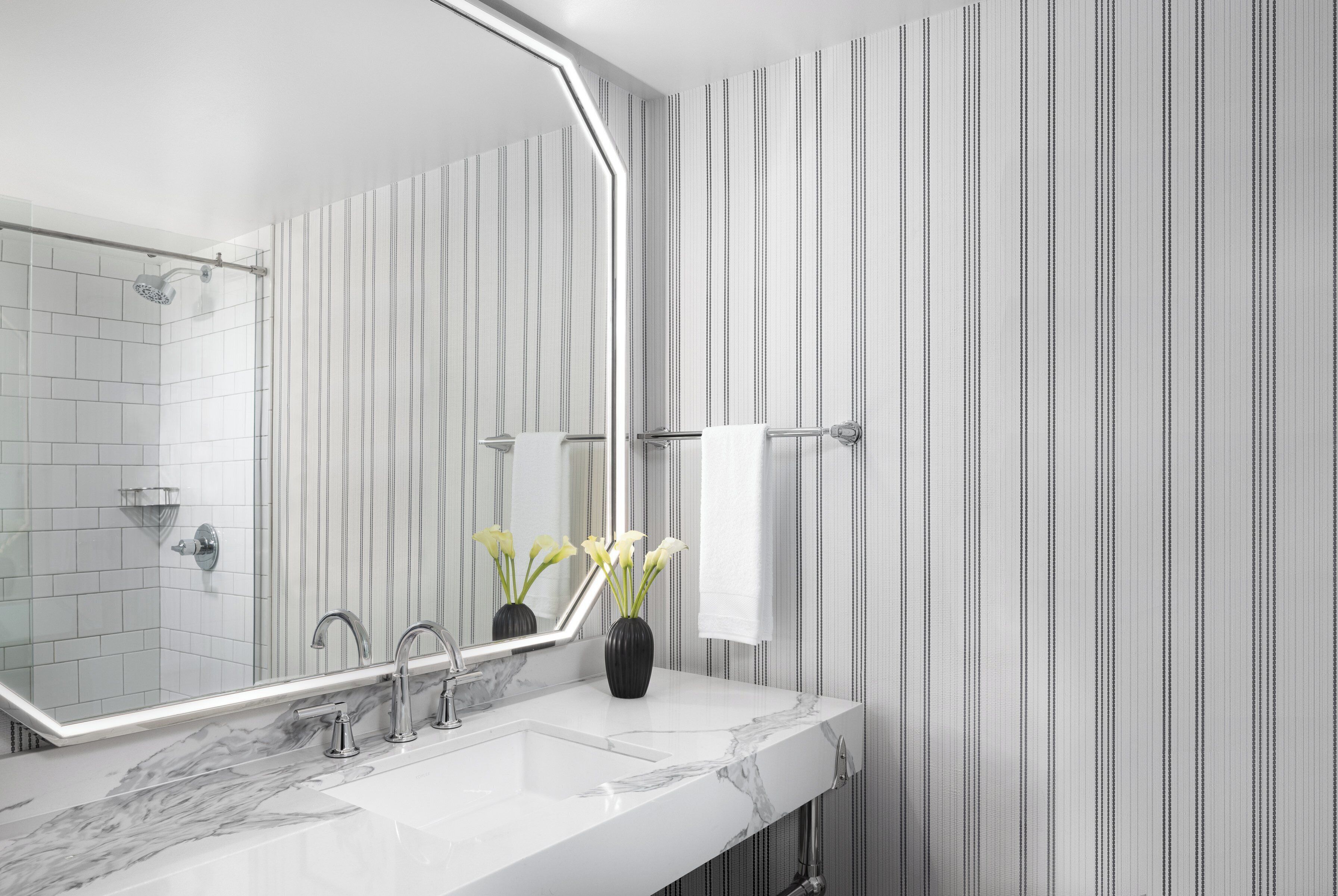 combined shower/bathtub, free toiletries, hair dryer, bathrobes