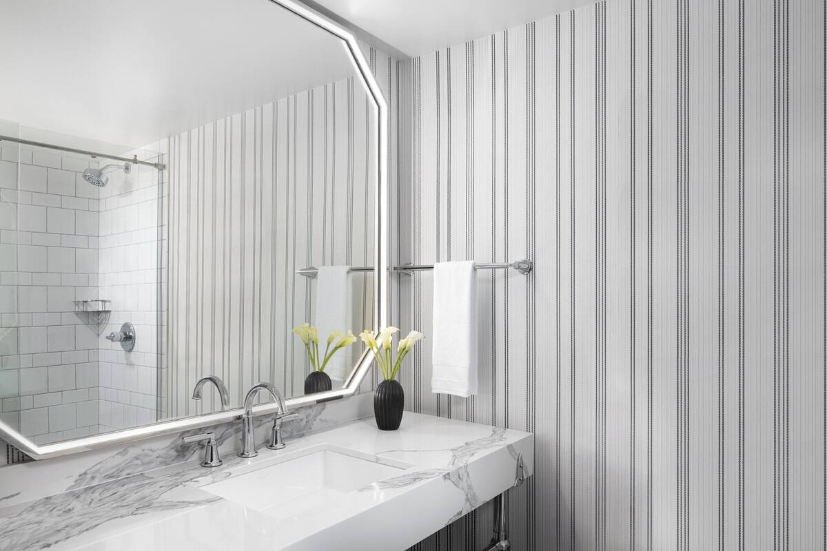 combined shower/bathtub, free toiletries, hair dryer, bathrobes