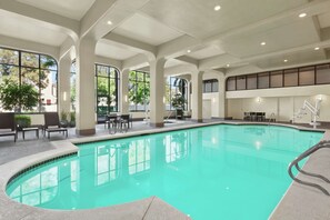 Indoor pool, open 6:00 AM to 10:00 PM, pool loungers