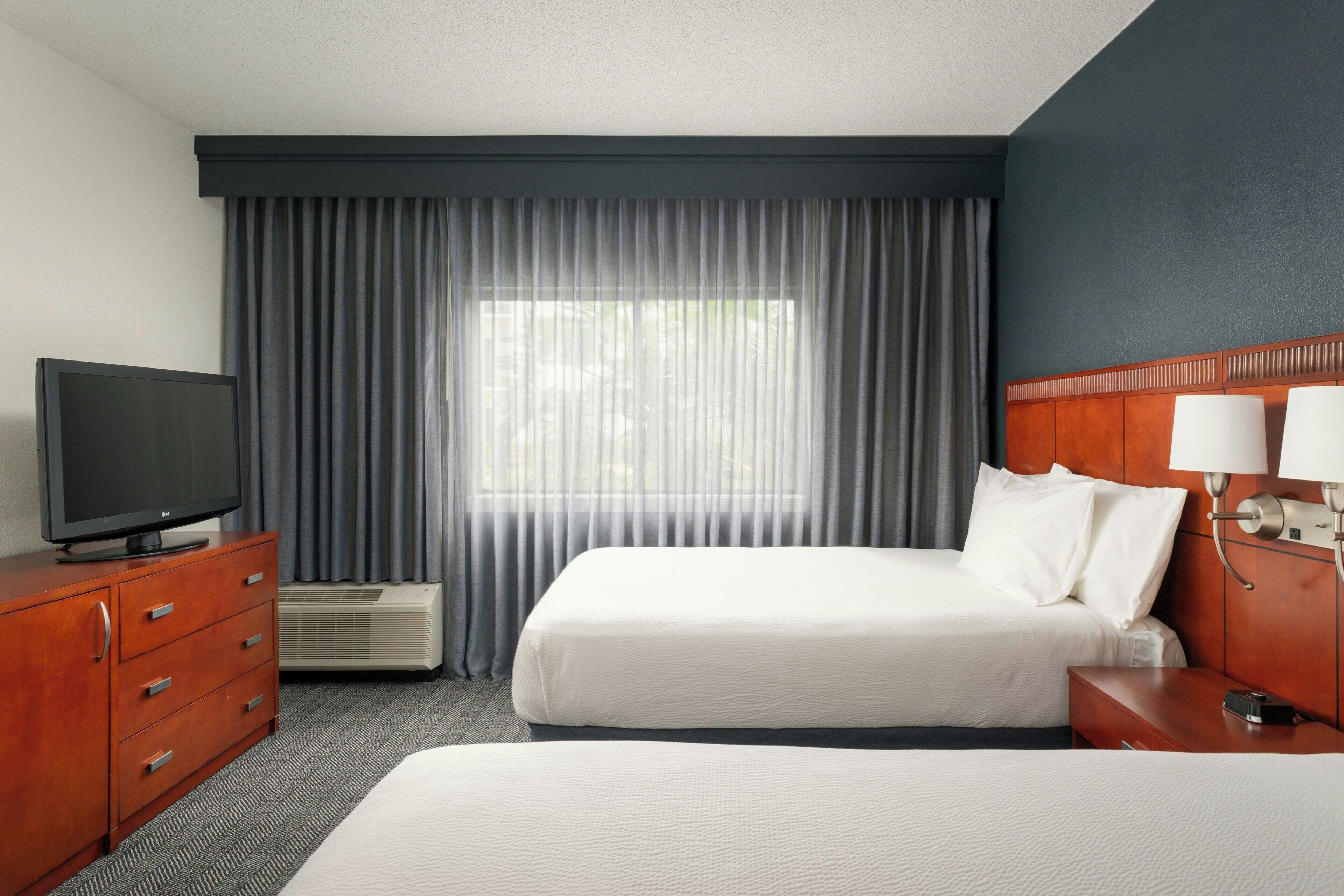 suite, 2 double beds | 1 bedroom, premium bedding, desk, blackout curtains