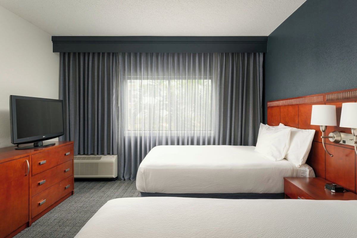 suite, 2 double beds | 1 bedroom, premium bedding, desk, blackout curtains