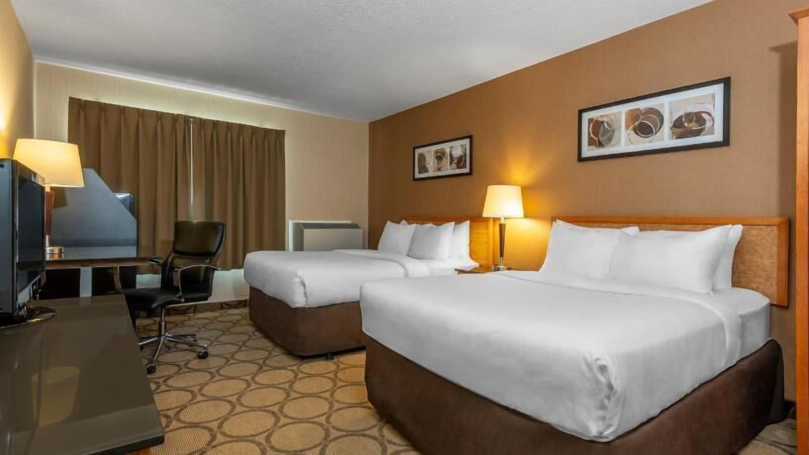 Premium bedding, pillow-top beds, desk, iron/ironing board