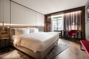 Roba de llit d'alta qualitat, minibar i caixa forta a l'habitació 