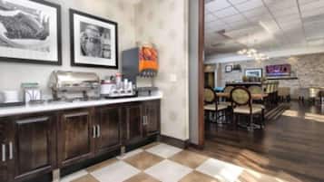 A modern kitchen with dark wooden cabinets, a white countertop, and a checkered floor.