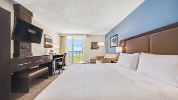 Suite, 1 King Bed with Sofa bed, Pool View | Iron/ironing board, free WiFi, bed sheets