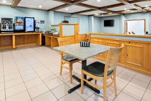 Enjoy meals and meetings in this well-appointed room with a granite-topped table and comfortable seating.