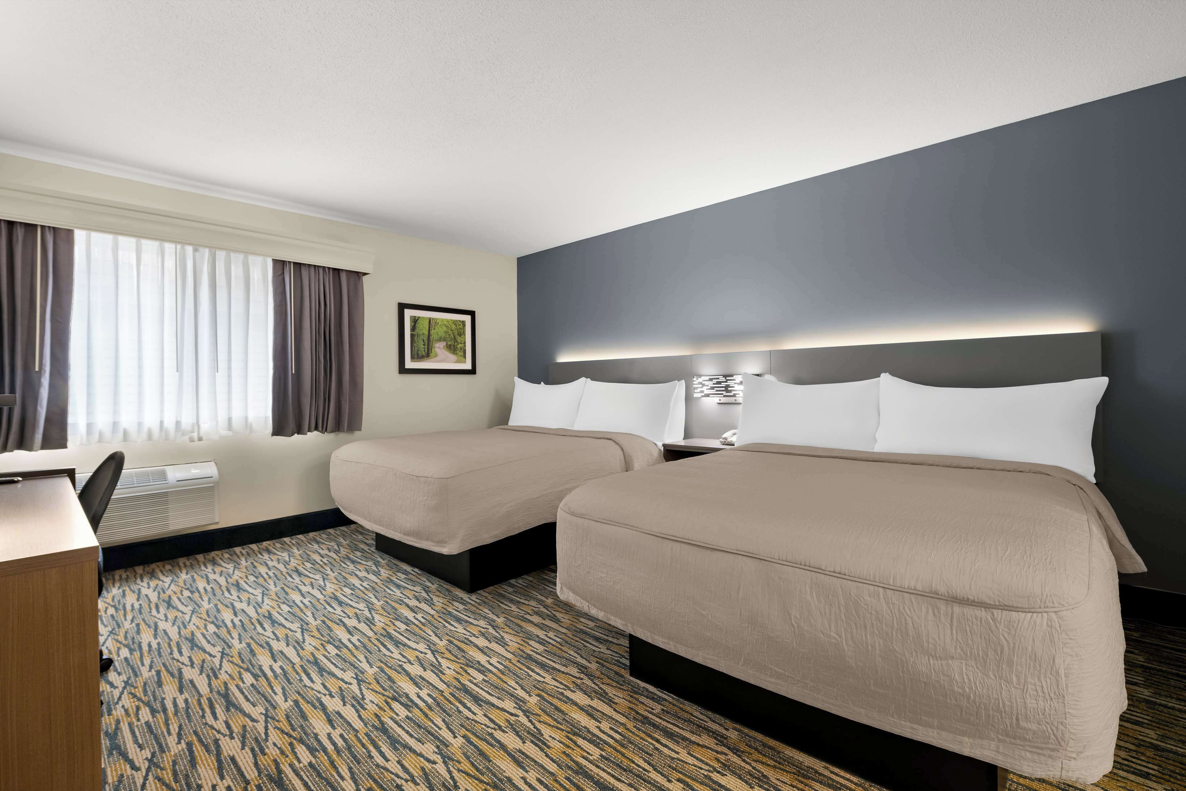 Suite, 2 Queen Beds, Non Smoking, Refrigerator & Microwave (with Sofabed) | Desk, iron/ironing board, free WiFi, bed sheets