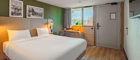 20 habitaciones, ropa de cama de alta calidad y escritorio