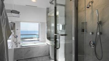 Combined shower/tub, free toiletries, hair dryer, slippers