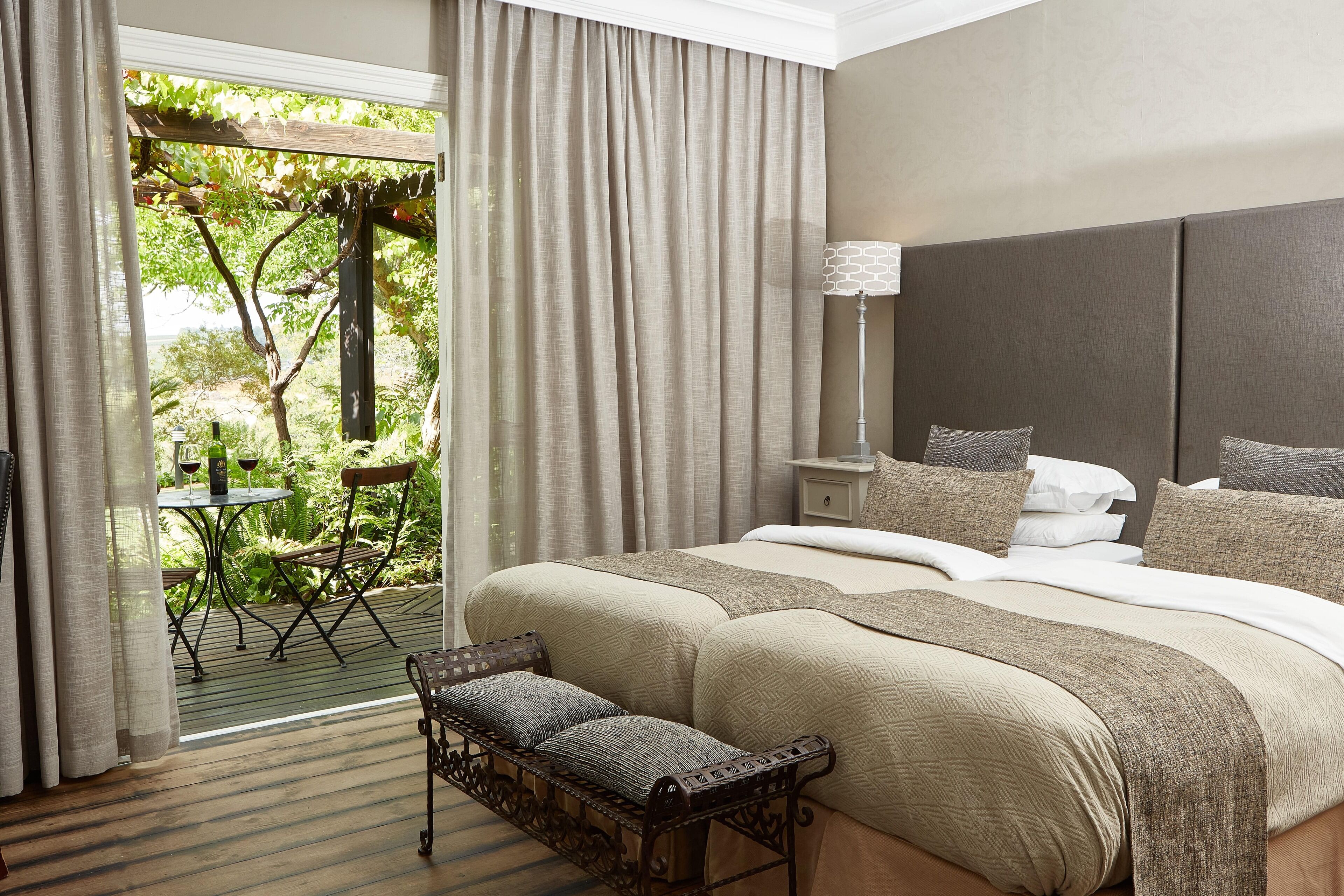 classic twin room | in-room safe, desk, blackout curtains, iron/ironing board