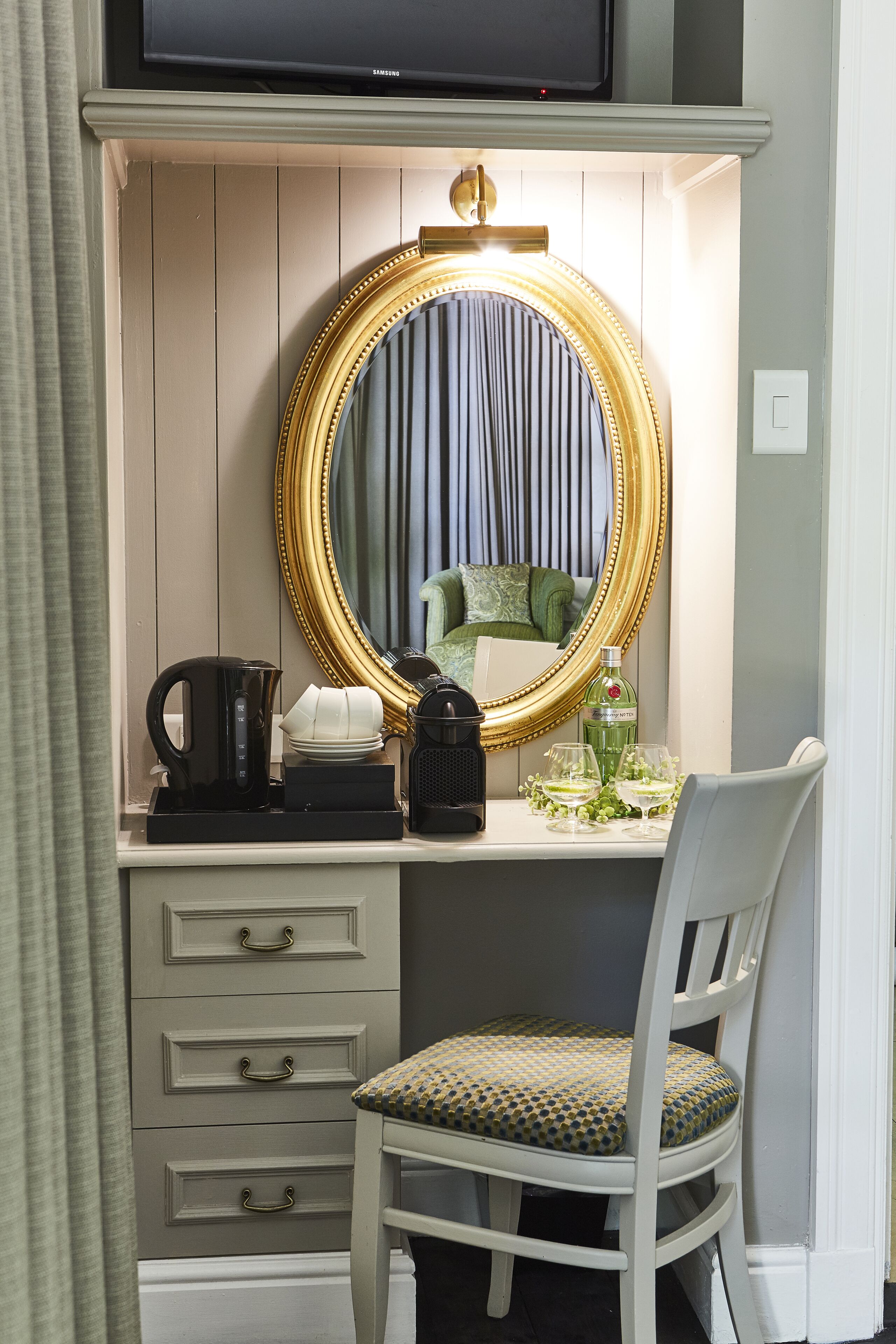 family room | in-room safe, desk, blackout curtains, iron/ironing board