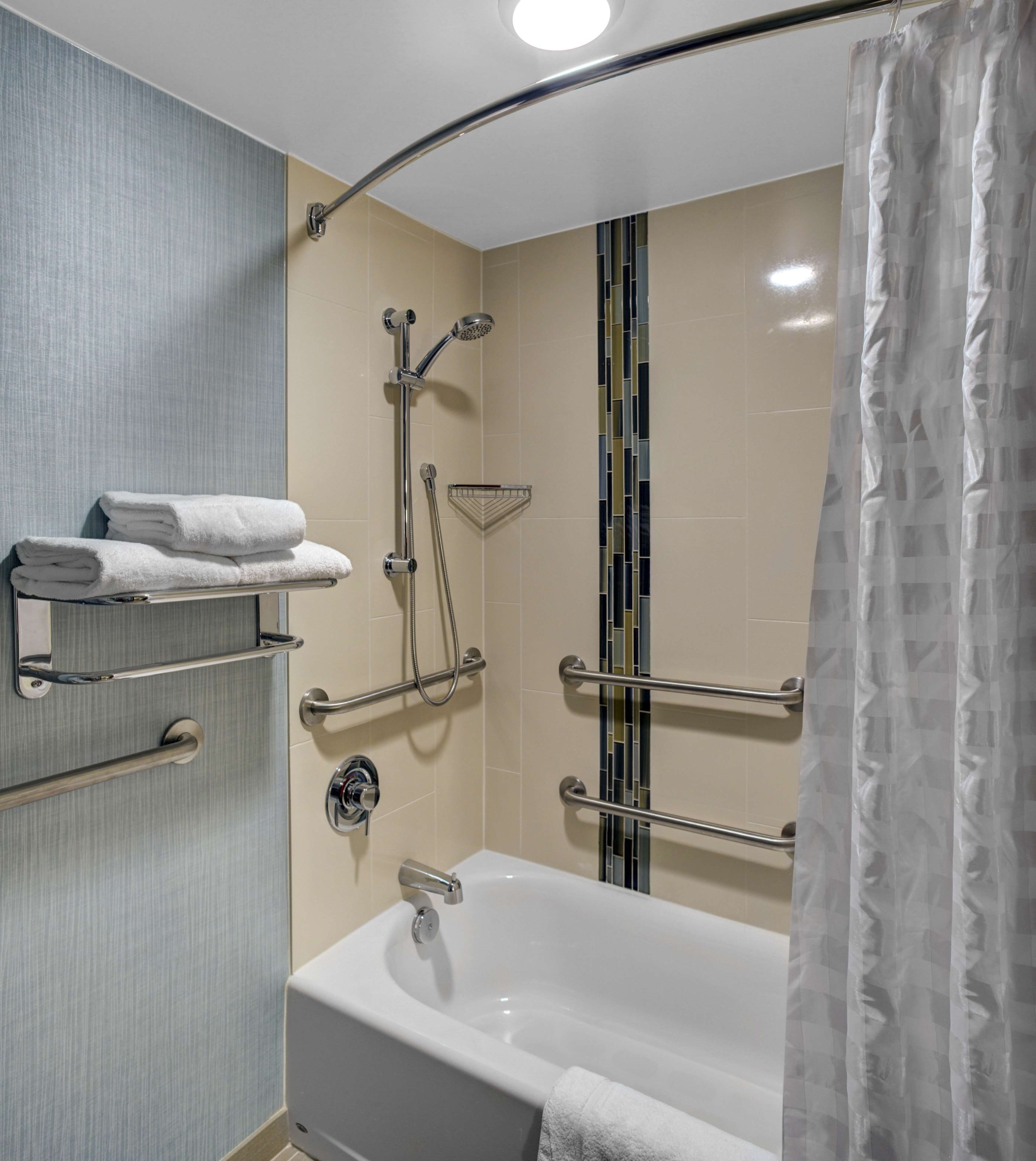 room, 1 king bed, accessible, bathtub | bathroom | combined shower/bathtub, designer toiletries, towels, soap