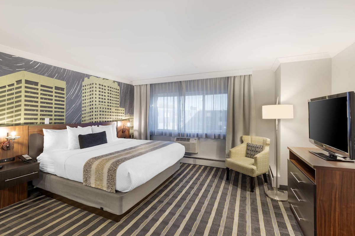 Premium bedding, pillow-top beds, in-room safe, desk