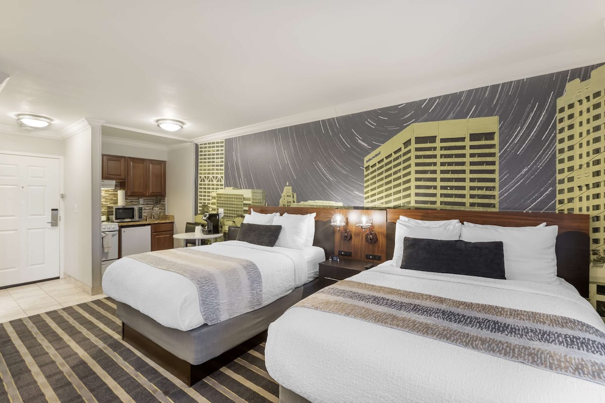 Premium bedding, pillow-top beds, in-room safe, desk
